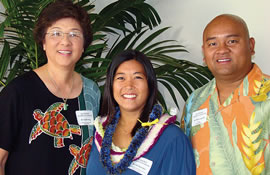 Hokulani Elementary teacher Shari Kaneshiro (center) is flanked by Kaimuki/Kalani complex superintendent Estelle Wong and Hokulani principal Alfredo Carganilla on May 26, after winning her 2006 Presidential Award. Photo by Kevin Kaneshiro.