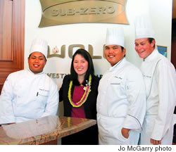 Culinary contest winners (from left) Sonny Acosta Jr. (second place), Robin Abad (first place) and James Murray (third place) with Sub-Zero Wolf operations manager Jean Nakanishi