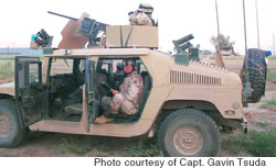 Capt. Gavin Tsuda along Route Irish, the main road linking Baghdad International Airport to the Green Zone