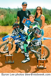 Mercedes with mom Kelly, grandpa Mitchell Meyer and trophies