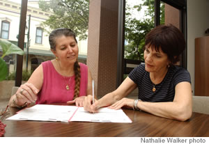 Business development specialist Cherylle Morrow (left) counsels Michele Adamson on opportunities for marketing her tutoring services business