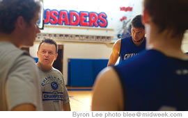 Coach Matt Mahar talks with some of his Chaminade players