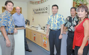 Taking a break from the world of insurance (from left): Malcolm Tajiri, Russ Robertson, Dean Hirahara, Bradford Tokioka and Tracy Adams