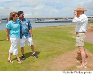 Brent snaps a photo of a couple in front of the Marine memorial