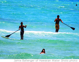 Stand up paddle surfing at the Surftech demo at Kewalos last weekend