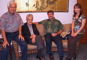 Taking a break at HMAA (from left): senior VP Rodney J. Park, John Henry Felix, president/COOTerry Mullen, and office manager Lois Estrella