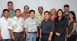 The Time Warner Telecom crew (front, from left): Everett Akagi, Todd Inoshita, Alan Deai, Cliff Miyake, Shelby Ogasawara and Candace Tagawa. (back) Ed Murley, Ken Wiecking, Powell Onishi, Sharon Whalen and Mitchell Miyoshi