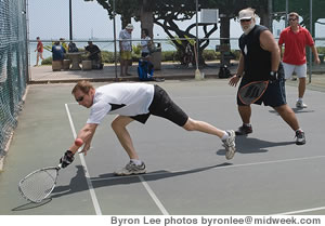 Bill Kowalski stretches to return a shot