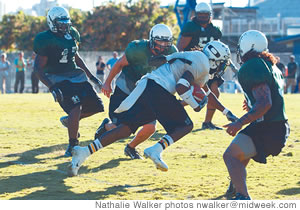 UH football receiver Ryan Grice-Mullen runs through the defense