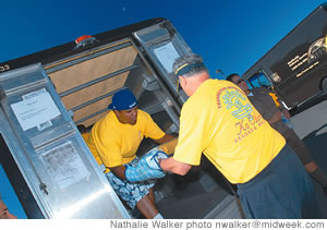 Volunteers prepare to serve up a Ko Olina Thanksgiving dinner