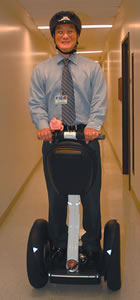 Dr. Roger Kimura on his Segway