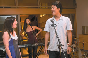 Marcela Biven, Sumi Matsubara and Aaron Komo harmonize