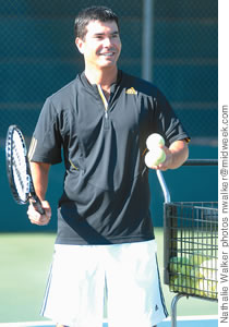 Punahou head tennis coach Rusty Komori