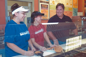 Nascimento with Mahea Valdez and Erinn O'Brien at Taco Del Mar Windward Mall