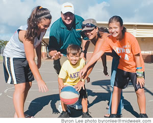 The family that hoops together: Ken and Beth with Kourtney, Kyla and Parker