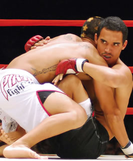 Marshall Harvest (right) grapples with Kyle Miyahana. Harvest, of Ewa Beach’s Animal House gym, will be battling for the state lightweight championship at Icon’s mixed martial arts event at Blaisdell Arena on March 31. Photo from Patrick Freitas.